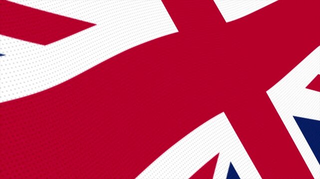 Flag of the United Kingdom waving slowly in the foreground and moving upwards.