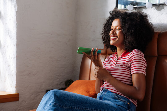 Woman Smiling While Sending Voice Message