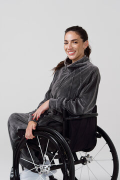 Woman in Wheelchair Smiling During Studio Session