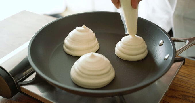 Piping tall souffle pancake batter
