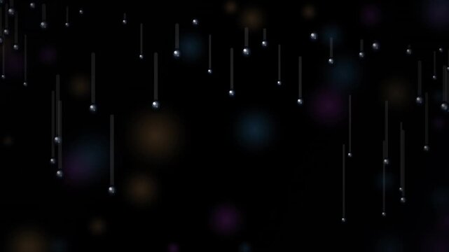 Falling Abstract Particles with bokeh effect during night creating a magical ambiance for celebrations