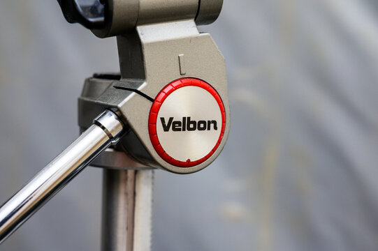 Iserlohn, Germany - September 06, 2026: Close-up of a Velbon camera tripod head joint and branded circular badge