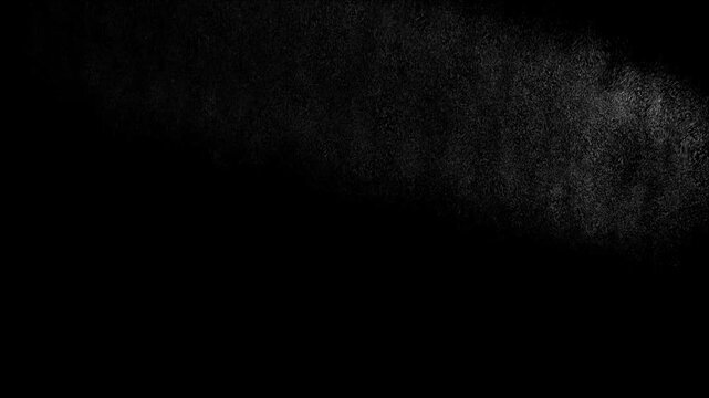 Christmas sale text reveal with white particle dispersion effect on black background