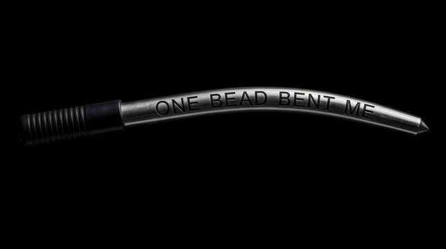 Metal pry bar tool engraved with the phrase one bead bent me isolated on black
