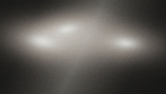 Monochrome Light Leak Bokeh Glow on Dark Grainy Film Texture Ove