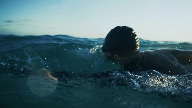 Swimmer In Cap And Goggles Swimming In Open Sea Water. Triathlete Training. Aquatics Water Sports 
