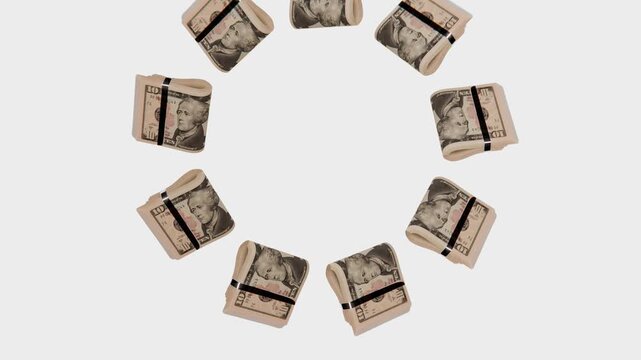 Spinning 3D render of United States 10 Dollar currency wads turning in a circle, isolated backdrop with green screen. Ideal for business b-roll.