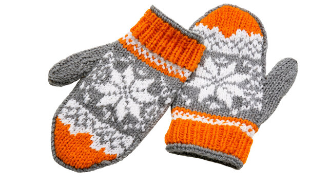 Pair of knitted winter mittens with snowflake pattern isolated on transparent background as png file