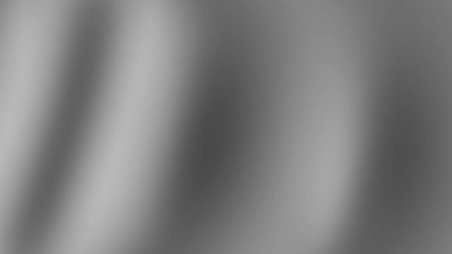 Abstract soft smooth gray gradient background with subtle light and shadow.
