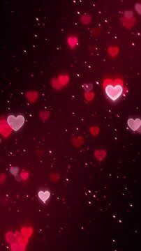 valentines day hearts and shiny glitter dust on dark red background animation, love and passion 14 February and anniversary vertical social media motion background