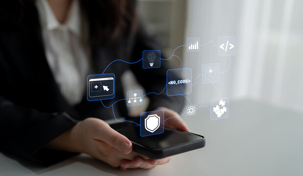 Business professional using smartphone with digital interface icons representing technology, data, security, and innovation concepts in a modern office setting Quark.