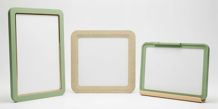 Three decorative frames with green and wooden accents on a plain white background