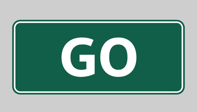Green road sign with white go text indicates permission to proceed or start of a journey on a plain grey background.