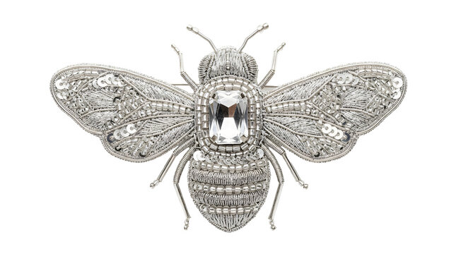 Intricate silver bee brooch featuring metallic embroidery, shimmering sequins and a central crystal on transparent background