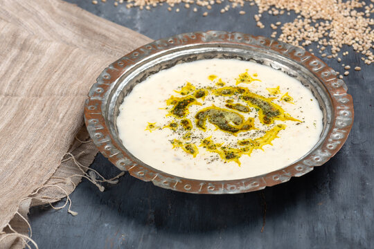 Traditional Turkish tarhana soup with wheat and dried mint