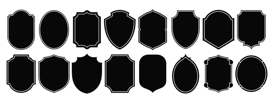 Collection of Shield Silhouettes: A diverse array of stylized shield shapes. graphic element, abstract design, decorative border, empty frame.