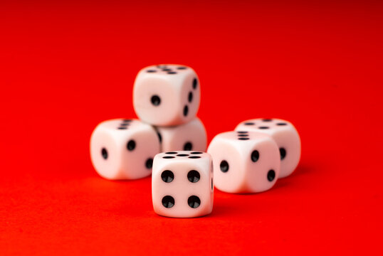 White game dice with black dots