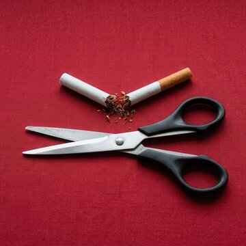 Quitting Smoking Symbolized By Broken Cigarette And Scissors