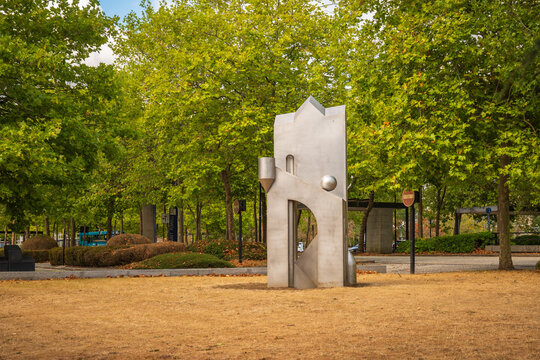 Abstract Modern Metal Sculpture in Urban Park Surrounded by Trees in the Theatre District, Milton Keynes