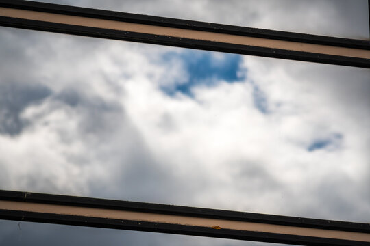Cloud Reflection in Window Panes With Architectural Lines and Overcast Sky Abstract in England UK