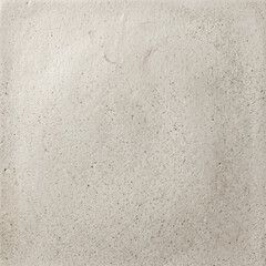 Fototapeta premium Macro detail of matte off-white ceramic glaze texture surface with subtle speckles
