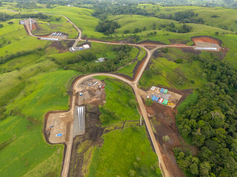 Wind farm construction site on green hills in guanacaste