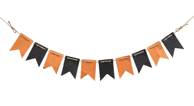 Festive Halloween bunting banner with orange and black paper flags on a rustic twine string