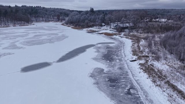 Winter landscape of the frozen lake in Poland.