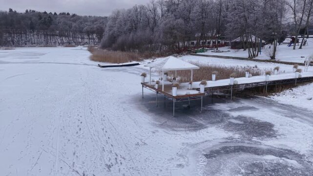 Winter landscape of the frozen lake in Poland.