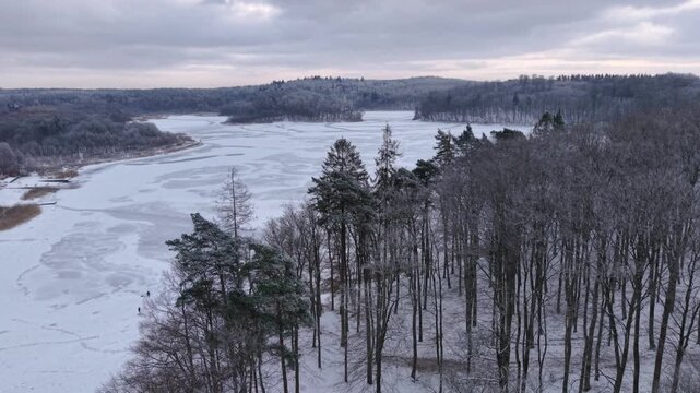 Winter landscape of the frozen lake in Poland.