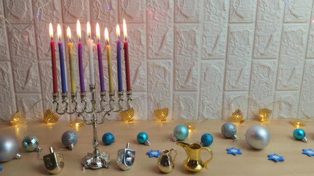 Jewish hanukkah celebration with menorah candles lighting