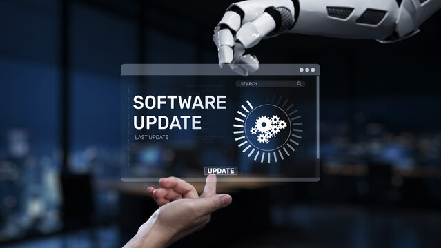 A futuristic robotic hand reaches towards a transparent software update interface, symbolizing advanced technology and innovation in a modern office setting. Synapse