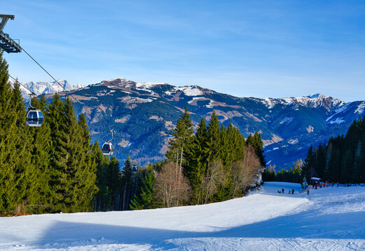 Ski piste and gondola lift at Zell am See in the Alps