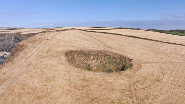 View of Trevone Round Hole over Trevone Bay from a drone, Trevone, Padstow, Cornwall, England, United Kingdom, Summer 2026