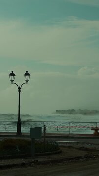 Ocean high waves destroy nearby buildings due to climate change