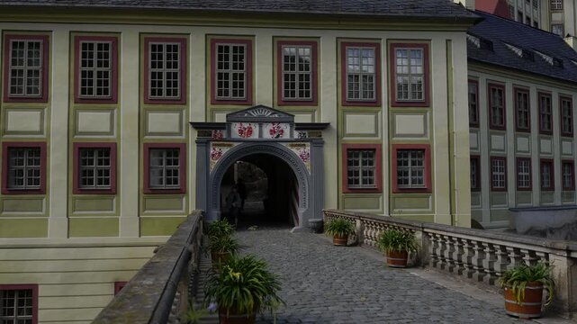Historic courtyard building with clock tower
