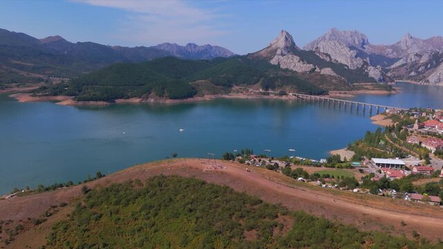 Summer rural tourism in the village of Ria&ntilde;o in Le&oacute;n, spain. Aerial view of riano village and reservoir in picos de europa national park