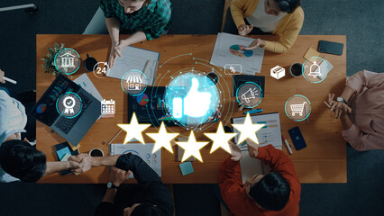 Group of diverse people collaborating around a table while analyzing data and discussing project...