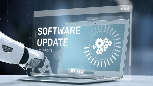A robotic hand interacts with a laptop showing a software update notification. The image symbolizes technological advancement, automation, and modern computing solutions. Salient