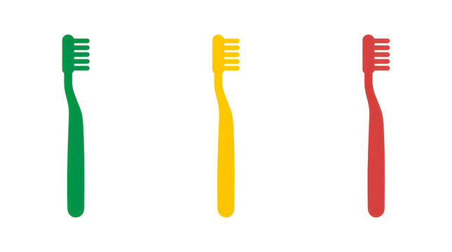 Three colorful toothbrushes standing side by side