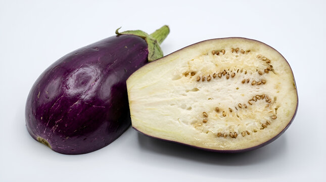One whole round glossy purple eggplant smooth skin and one lengthwise half showing creamy white fibrous flesh with small brown seeds neatly arranged, fresh organic vegetable, clean white minimalist ba