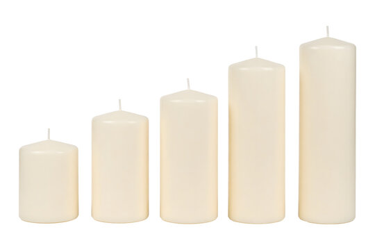 White wax pillar candles arranged in a row of five increasing heights for home decor lifestyle photography&nbsp;&nbsp;