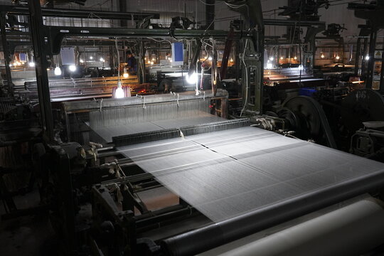 Textile Workshop with Industrial Looms Manufacturing Cloth