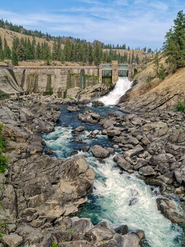 The Spokane River splashes over rock as it flows below the spillway of the Little Falls Dam near Reardan, Washington, USA