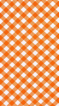 Bright orange and white diagonal gingham checkered pattern background for autumn and picnic themes.