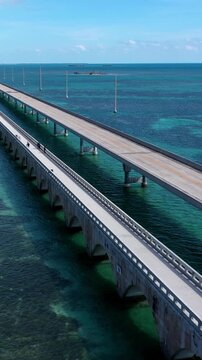 Aerial shot of the Seven Mile Bridge in Florida which connects several of the Florida Keys on the way to Key West. Vertical Video.