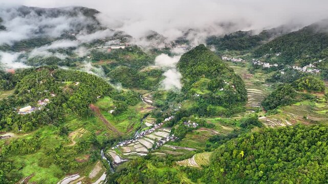 Aerial shot of the amazing terraced rice paddies in the mountains near Banaue Philippines.