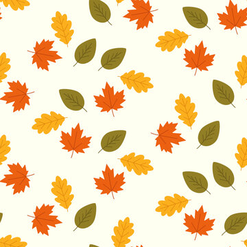 Seamless pattern with colorful autumn leaves on white background