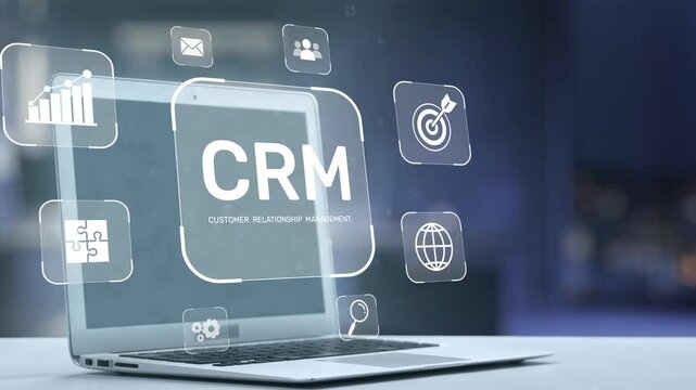 A futuristic robot interacts with a laptop, showcasing a Customer Relationship Management concept. Various business icons highlight a modern digital workspace and efficiency. Salient
