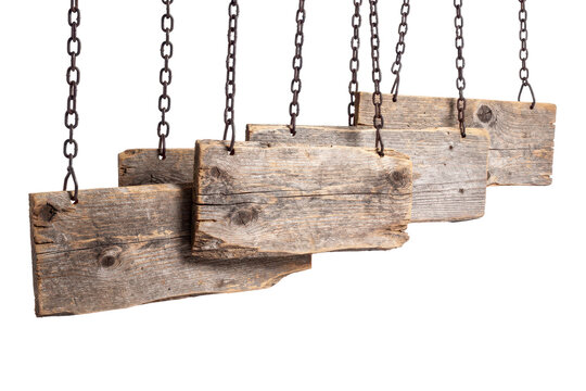 Weathered wooden planks hanging from metal chains against black background